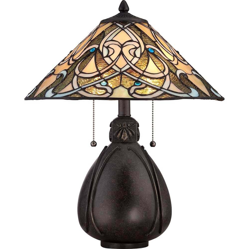 Lampe à poser à abat-jour conique en verre coloré et base bronze.