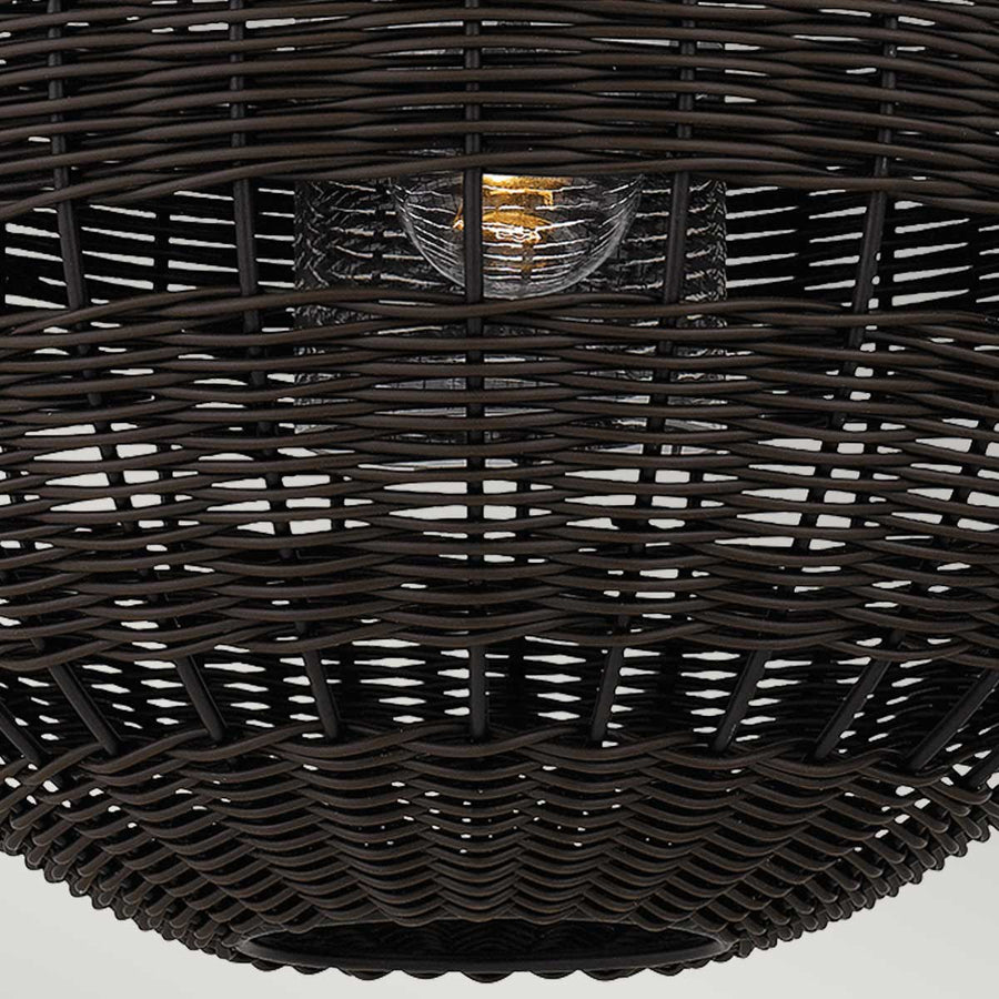 Détail rapproché du tressage et du diffuseur en verre cannelé interne