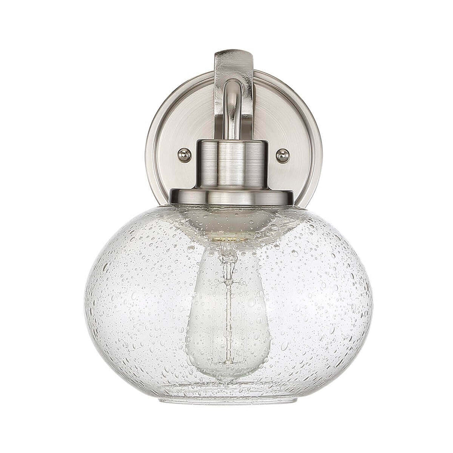 Vue de face, verre grêlé transparent laissant voir l'ampoule à filament non allumée