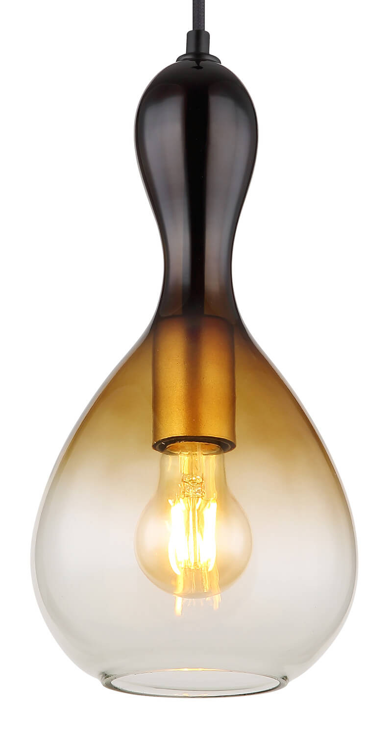 Détail rapproché du verre et de l'ampoule à filament allumée à l'intérieur
