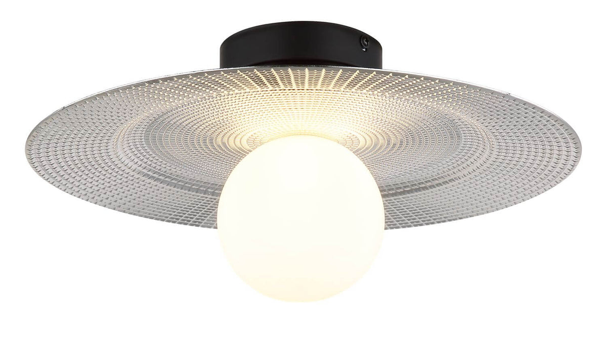 Vue rapprochée du disque en verre texturé encerclant le globe blanc allumé