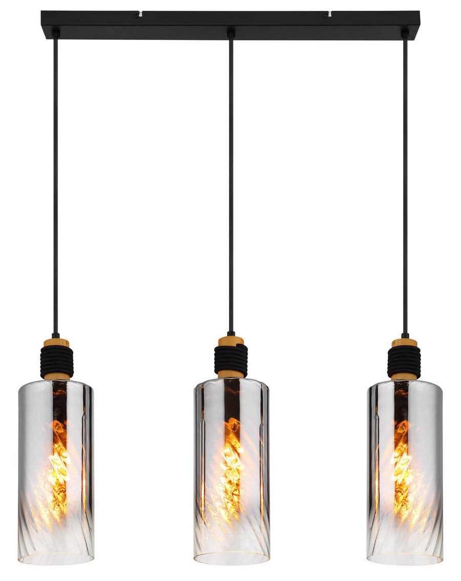Vue de face du luminaire allumé, ampoules Edison dorées dans les cylindres de verre