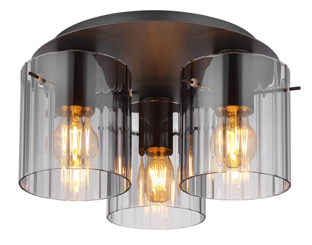 Luminaire noir à trois cylindres en verre fumé, ampoules allumées, vue de face