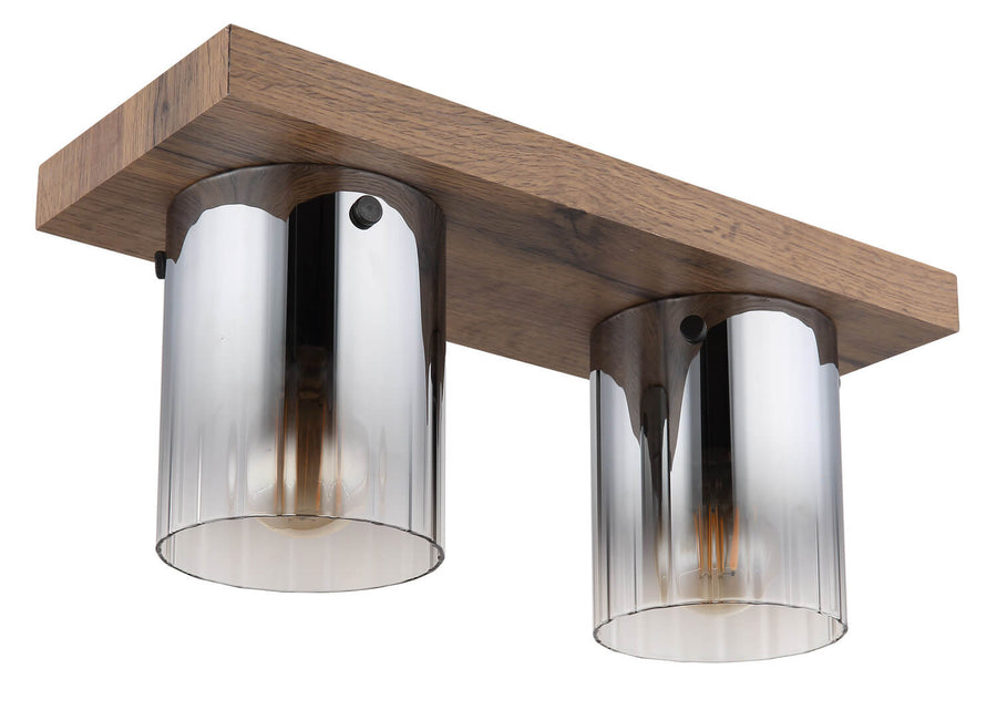 Vue de trois quarts du plafonnier, base en bois et verres cylindriques fumés.