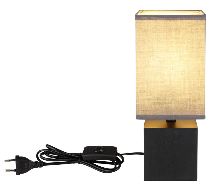 Lampe de profil avec câble d'alimentation noir, interrupteur et prise électrique visibles