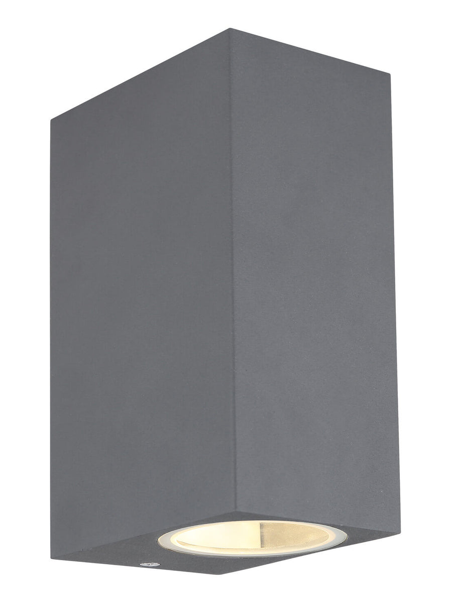 Autre angle du luminaire mural gris foncé, mettant en valeur le boîtier aluminium et l'éclairage bas.