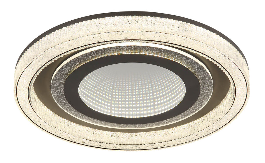 Vue rapprochée du plafonnier avec bordure en verre et LED centrale allumée.