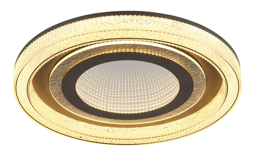 Plafonnier allumé en lumière chaude, bordure en verre et LED centrale visible.