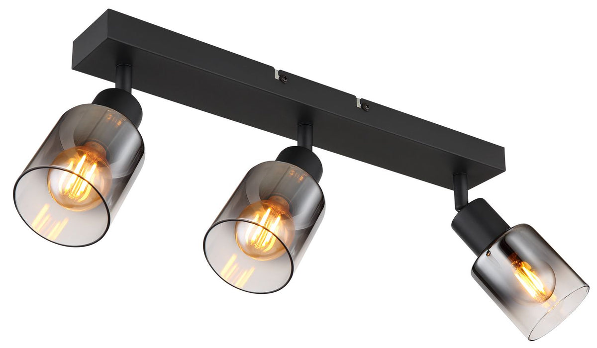 Autre vue rapprochée du luminaire noir mat, mettant en valeur les trois diffuseurs en verre fumé.