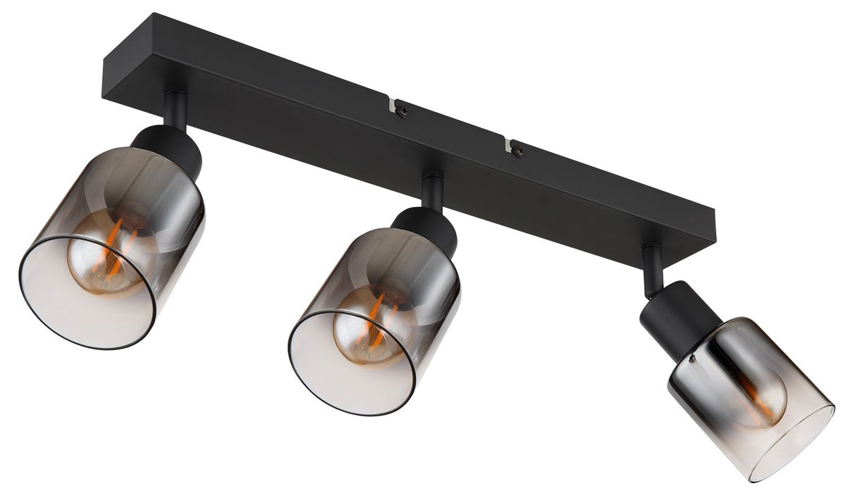 Vue en plongée du spot trois points, montrant la barre rectangulaire noire et les ampoules visibles.