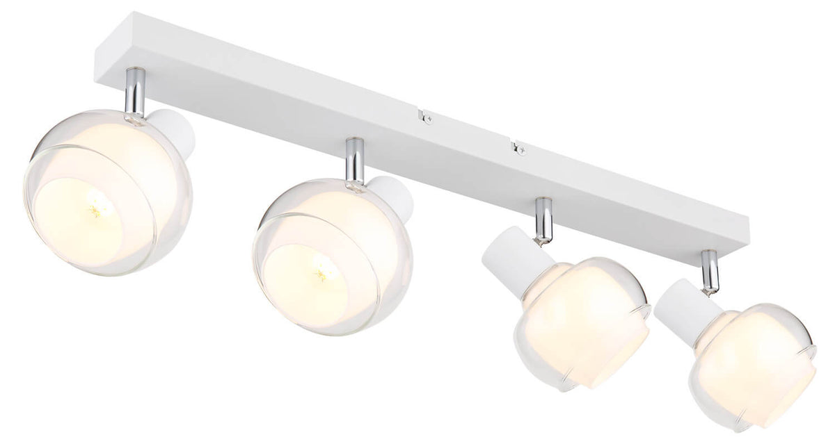 Second angle du luminaire blanc, projecteurs ronds orientables et longue barre rectangulaire de fixation.