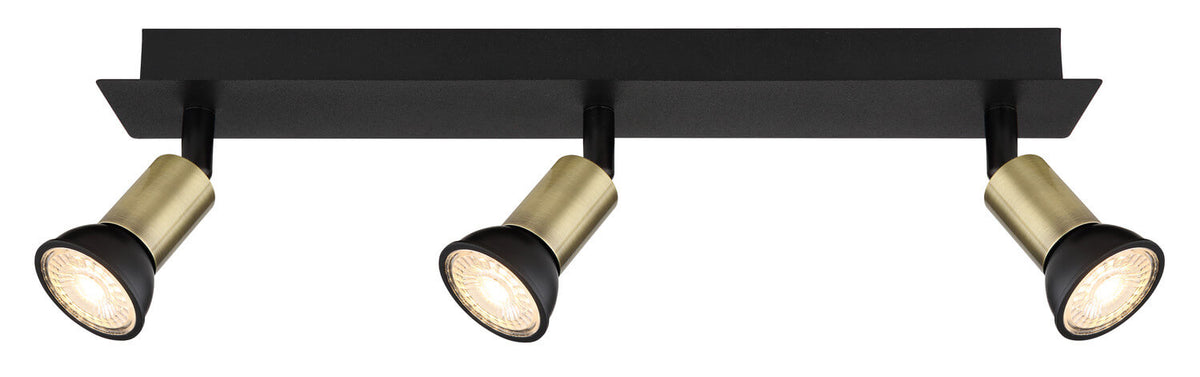 Vue de face du luminaire plafond : barre noire et trois spots ronds en laiton orientables.