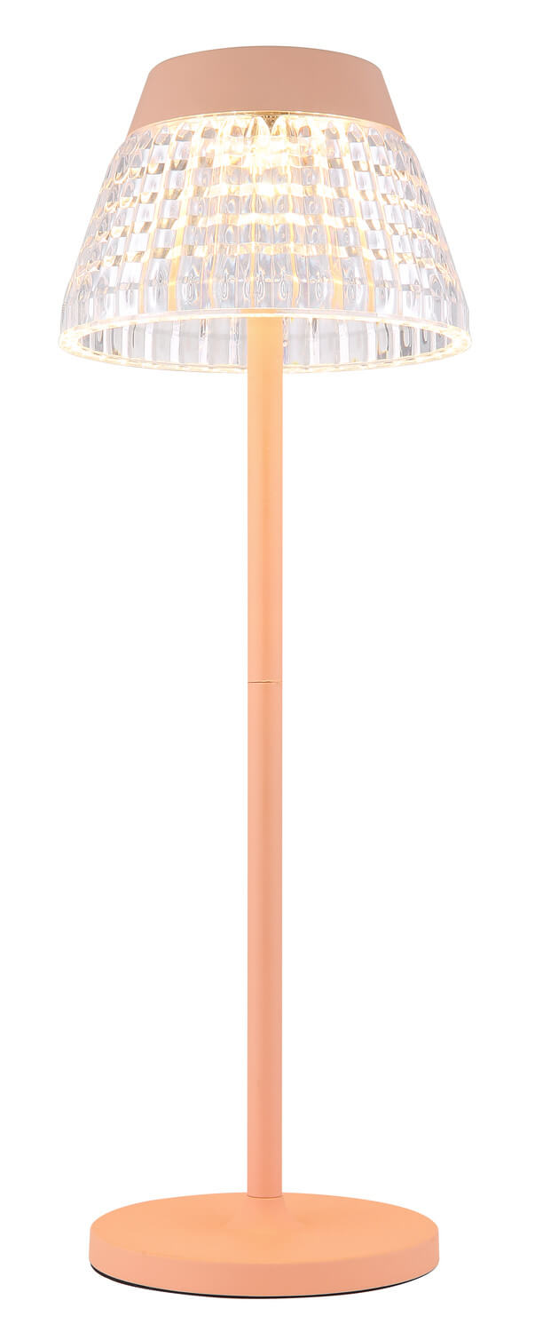 Lampe allumée sur fond blanc, halo doré sous l'abat-jour conique