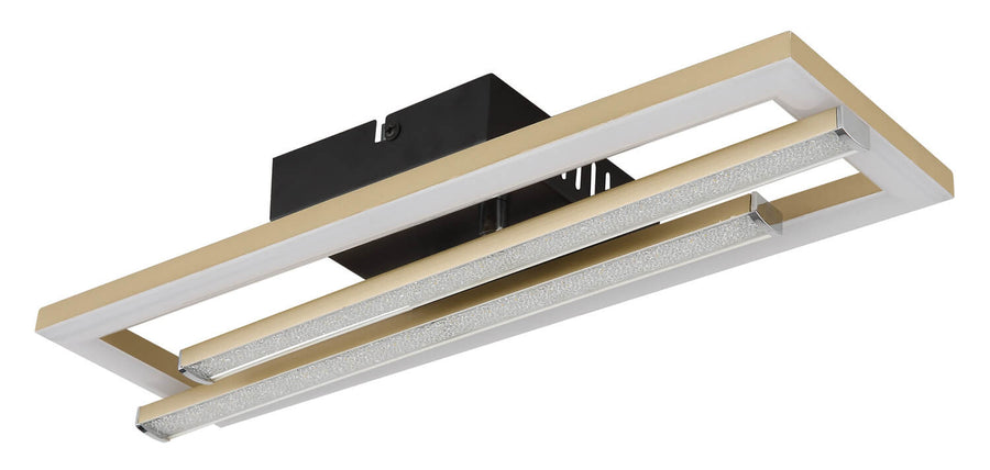 Plan serré sur le cadre doré et le pavé lumineux scintillant