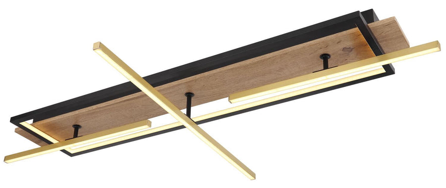 Vue rapprochée du luminaire montrant la structure noire, le panneau de bois et les tiges dorées.