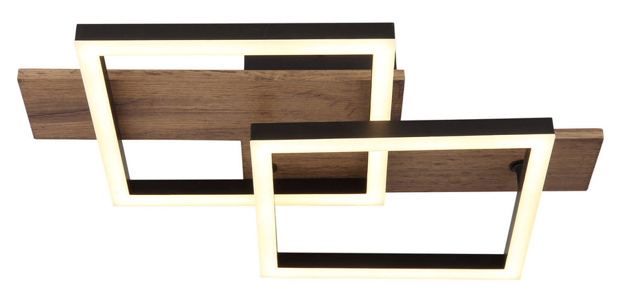 Vue de face du plafonnier allumé, cadres noirs et bois en arrière-plan