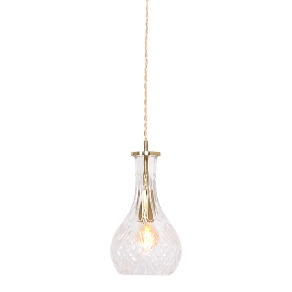 Suspension en verre transparent et laiton doré, vue de face sur fond blanc