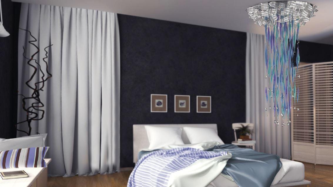 Luminaire suspendu coloré installé dans une chambre moderne au-dessus d'un lit