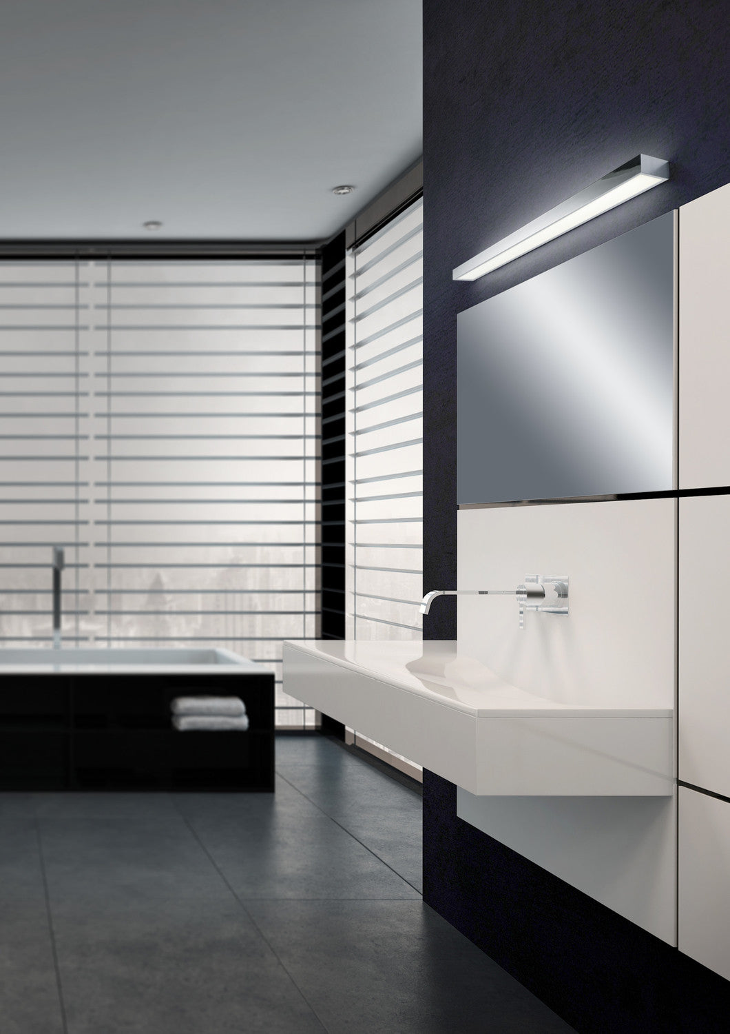 Mise en ambiance dans une salle de bain sombre avec vasque et miroir