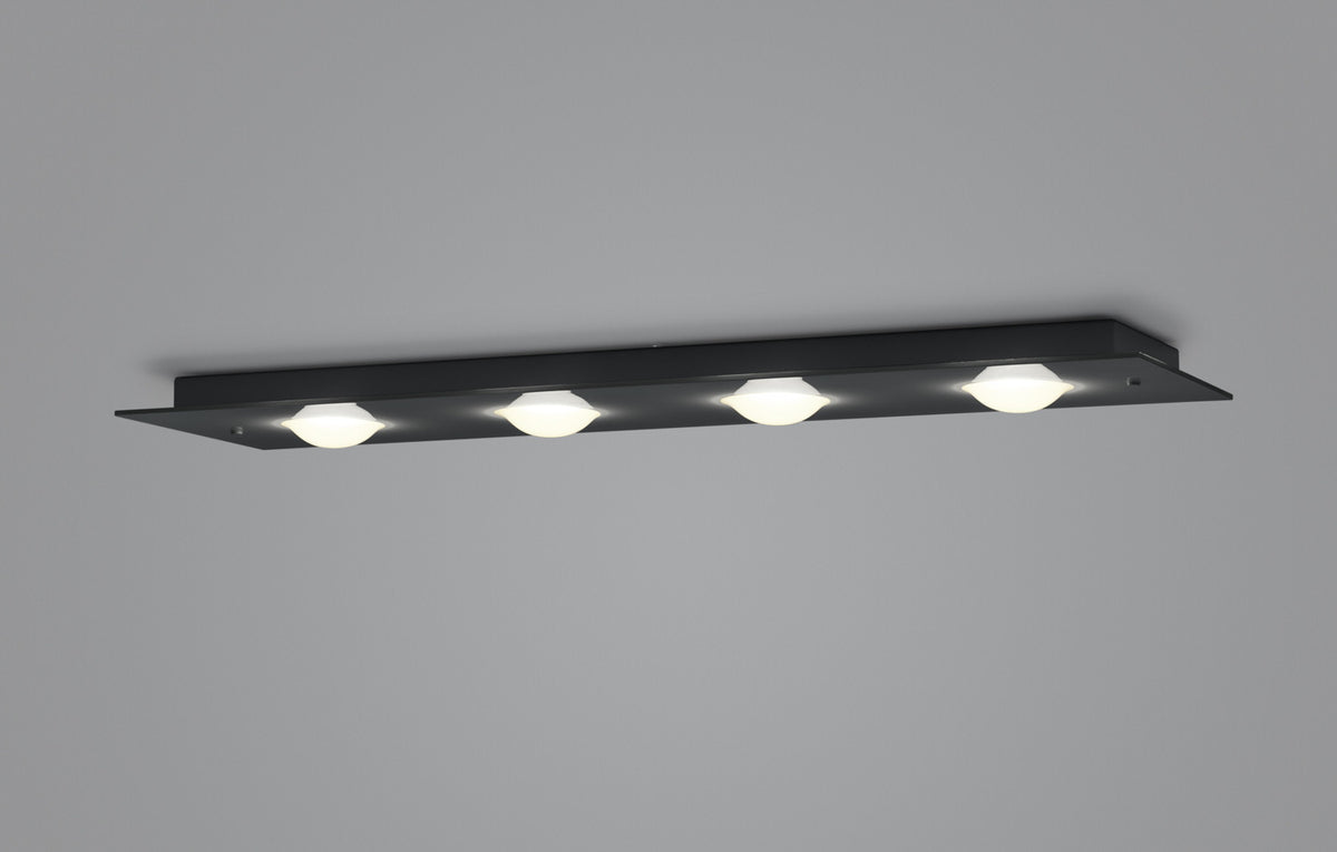 Vue de profil montrant la finesse de la platine noire et les quatre modules lumineux