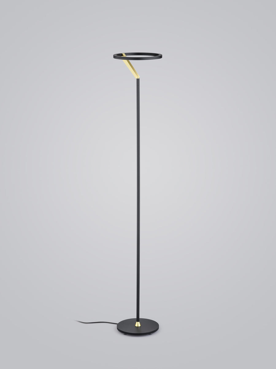 Vue en pied du lampadaire noir, anneau lumineux supérieur et câble au sol.