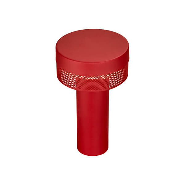 Vue en plongée de la lampe rouge montrant la grille perforée allumée