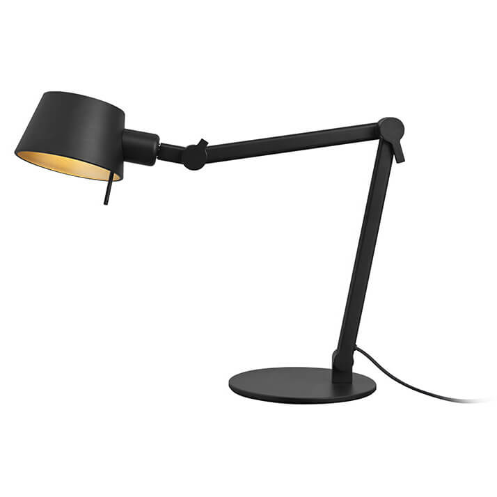 Vue de profil du luminaire, bras déployé et abat-jour orienté vers le bas