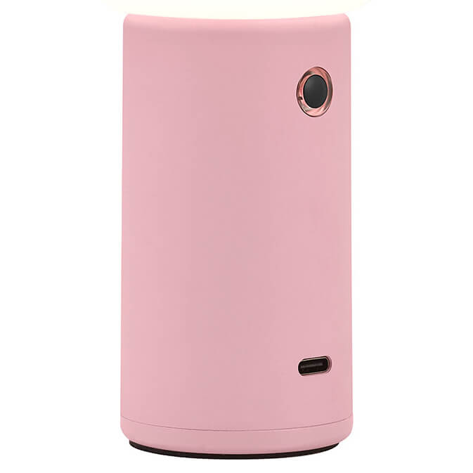 Détail du socle rose mat avec bouton circulaire et port USB-C de recharge