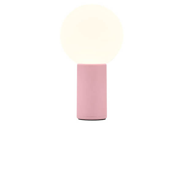 Lampe à poser rose et blanc, globe lumineux allumé, vue de face sur fond blanc