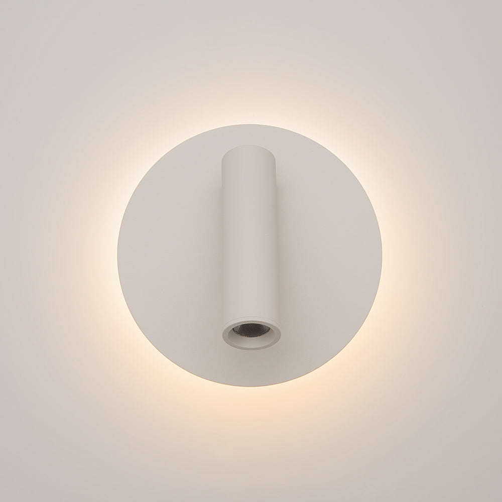 Détail de face avec le tube vertical éclairant vers le bas, socle circulaire blanc