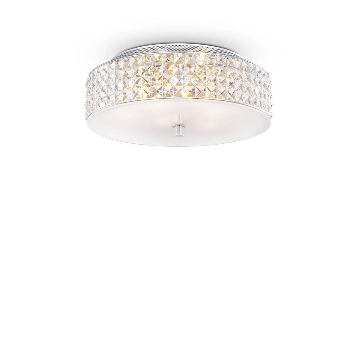 Plafonnier rond de face sur fond blanc, bordure en cristal taillé et diffuseur opale.