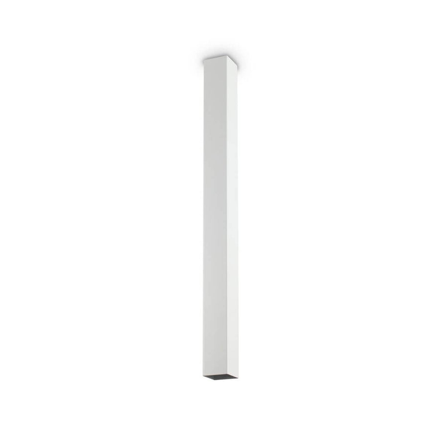 Luminaire blanc vu de face sur fond neutre, long profil vertical rectangulaire fin