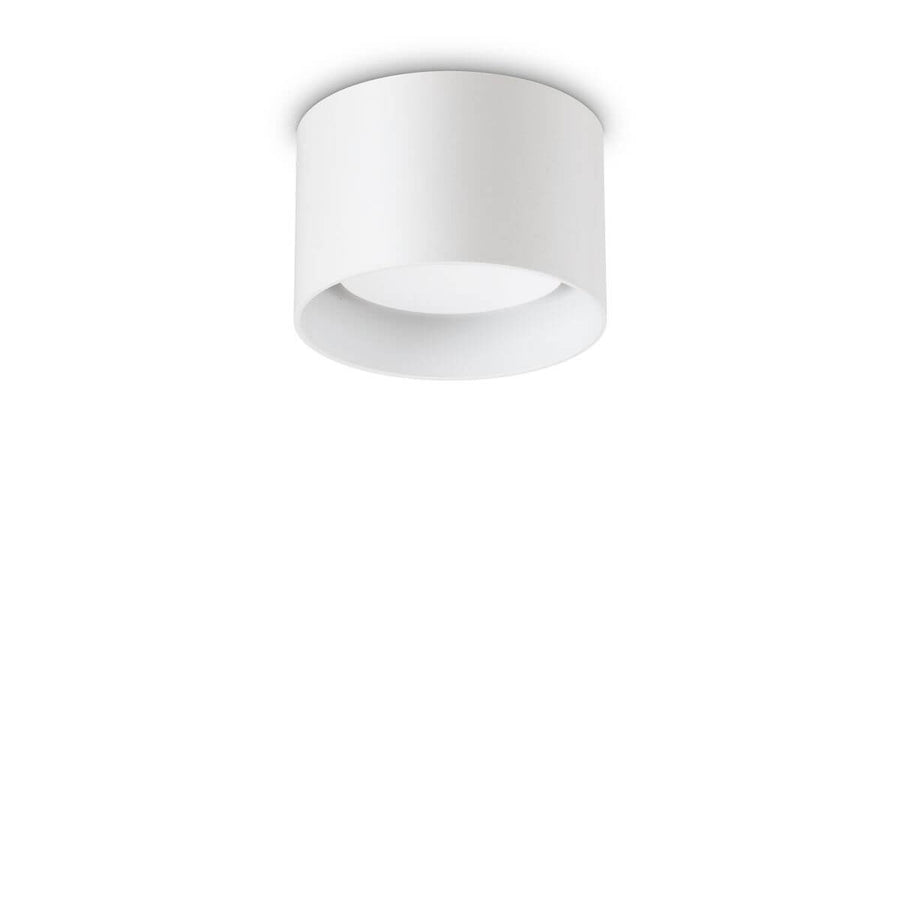 Plafonnier cylindrique blanc vu de trois quarts sur fond neutre