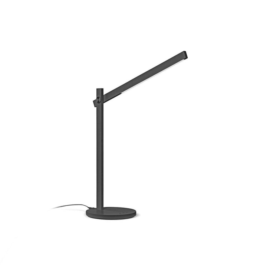 Lampe noire de face sur fond blanc, bras incliné et base ronde.