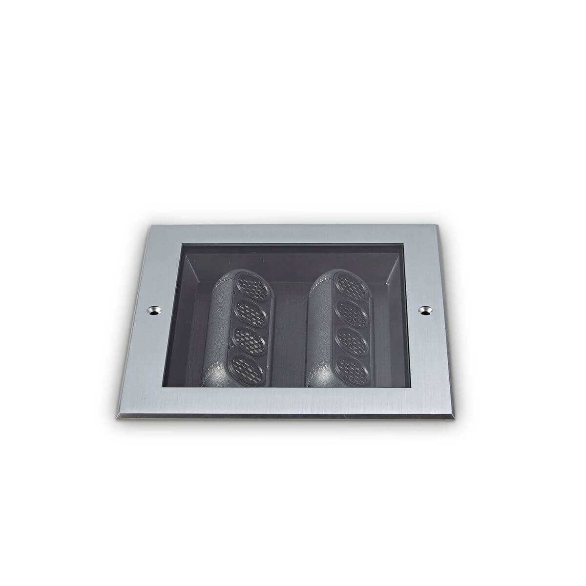 Vue de face du luminaire rectangulaire avec deux blocs noirs et grilles.