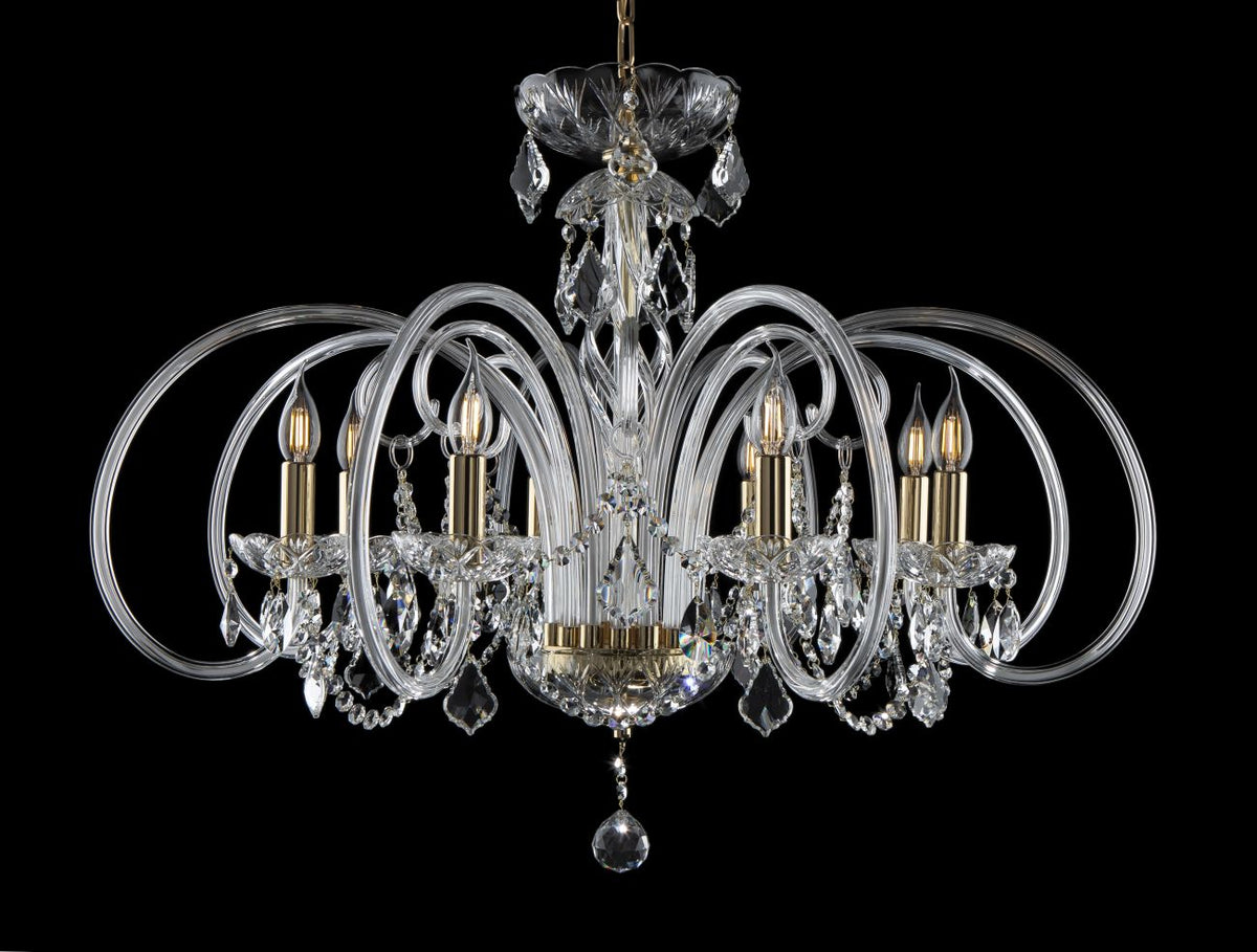 Lustre de face, bras en verre transparent formant de grandes boucles et pendeloques de cristal