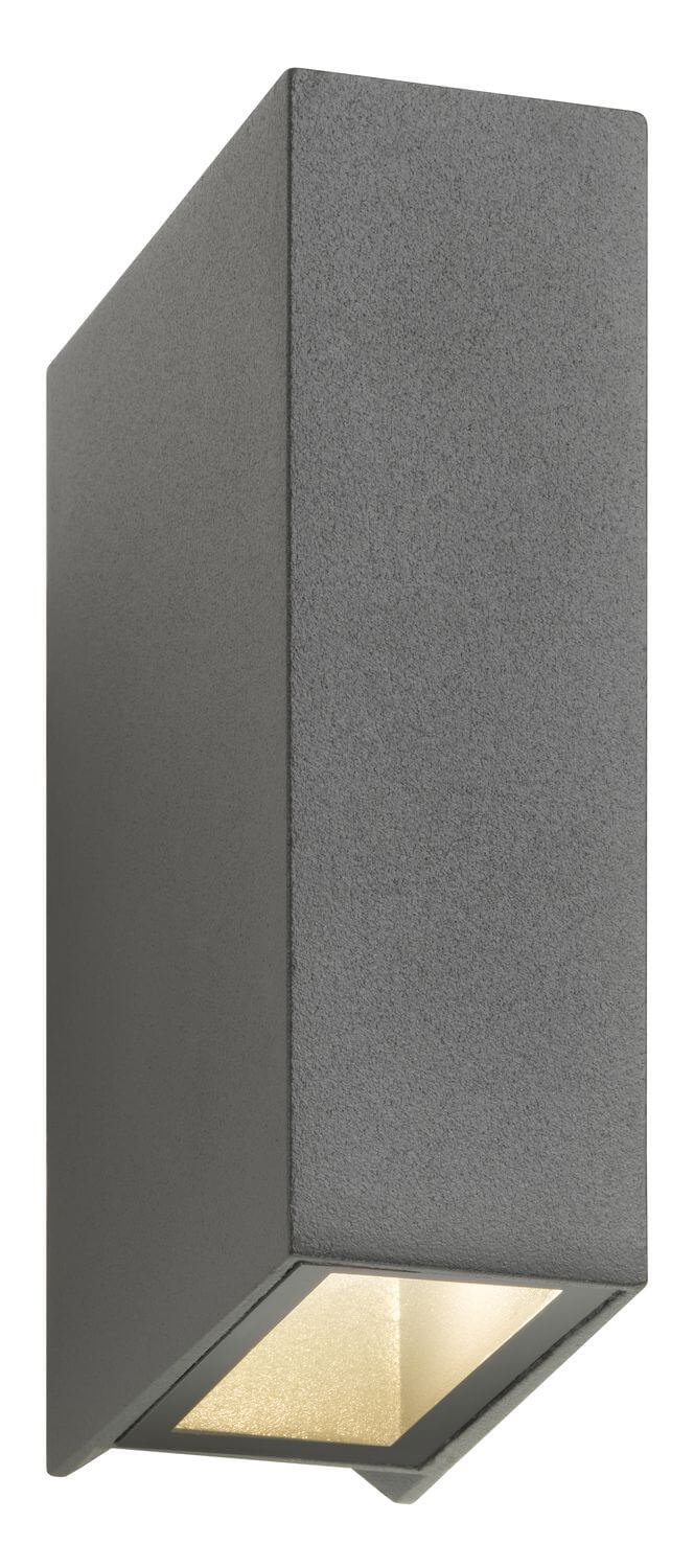 Applique murale anthracite en fonctionnement, diffuseur inférieur éclairé d'une lumière chaude.