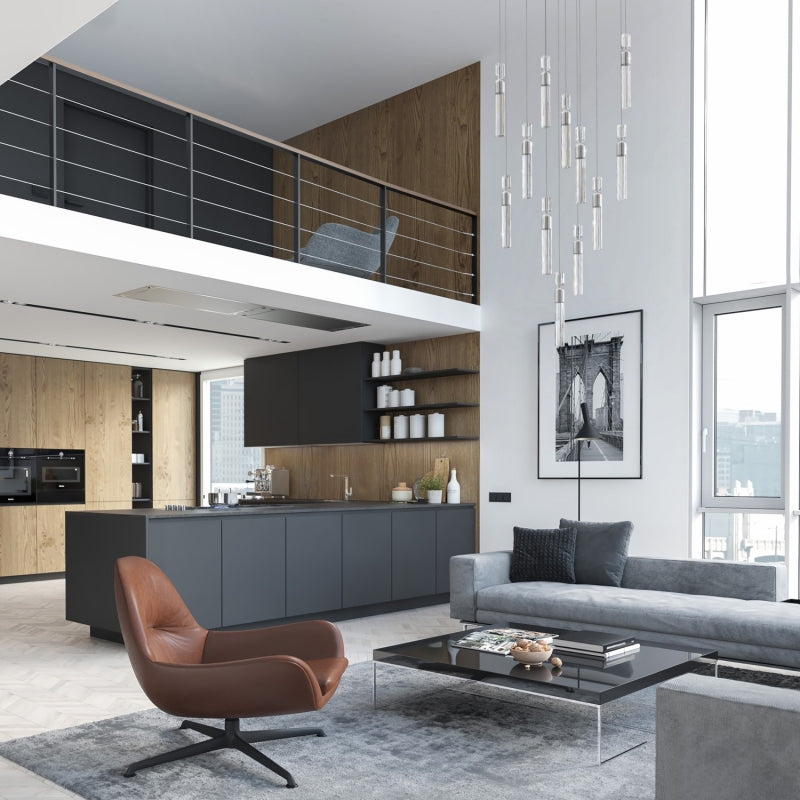 Mise en ambiance dans un séjour moderne, suspension au-dessus d'un canapé gris