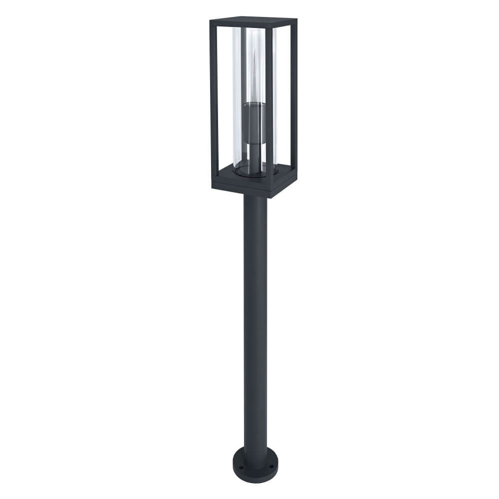 Vue d’ensemble du luminaire sur mât, cadre aluminium noir et verre transparent.