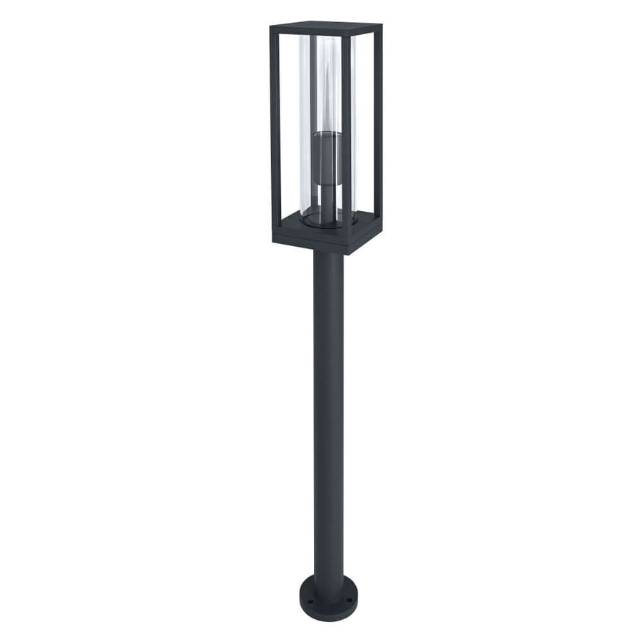 Vue d’ensemble du luminaire sur mât, cadre aluminium noir et verre transparent.