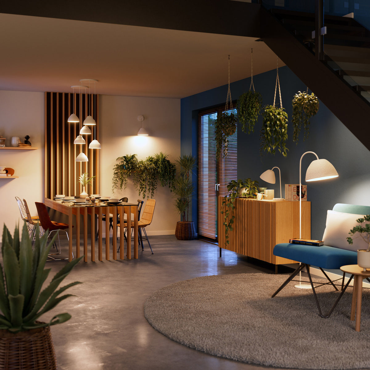 Mise en ambiance d’une salle à manger, lampe blanche posée sur un meuble en bois.