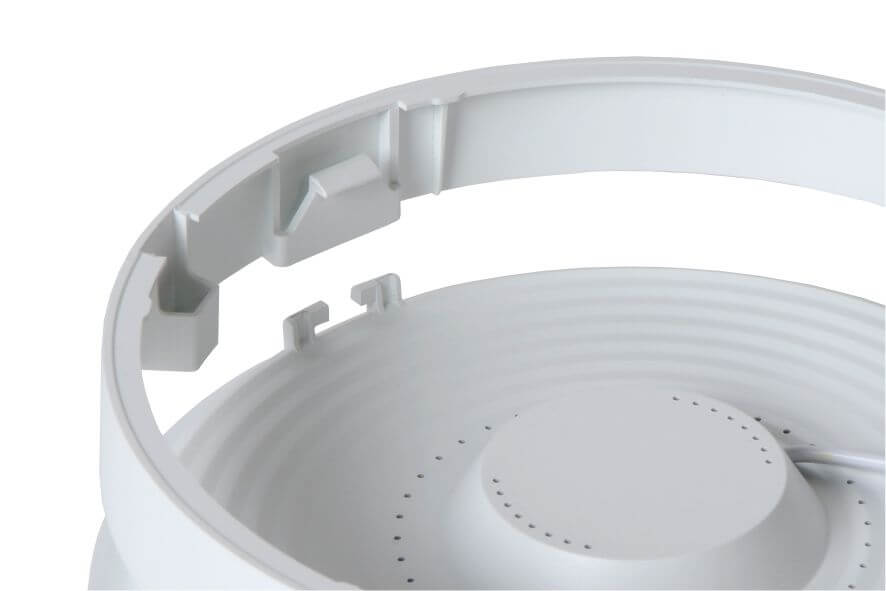 Détail des clips et ergots de fixation interne du bandeau circulaire en matière blanche