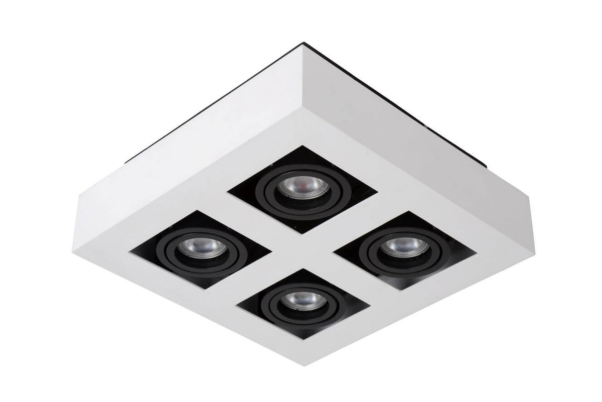 Produit présenté en perspective, quatre spots carrés éteints sur socle blanc