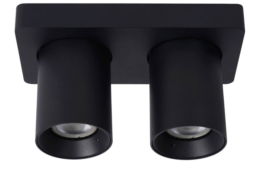 Autre vue de face montrant la base rectangulaire noire et les deux réflecteurs des spots.