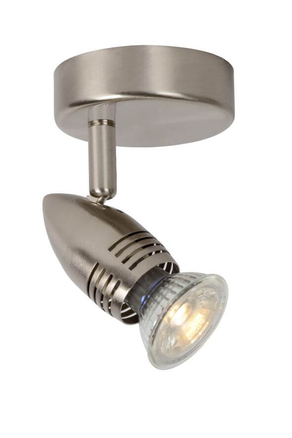 Spot orientable chromé de trois quarts, tête conique et lentille en verre strié.