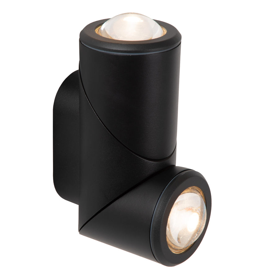 Les deux projecteurs cylindriques orientables éclairés, fixés sur platine murale noire.