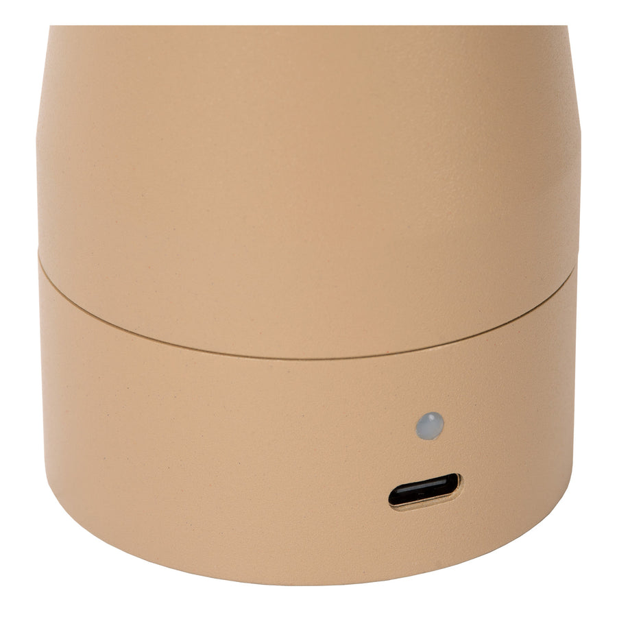Détail du socle avec port USB-C et témoin lumineux de charge intégré.