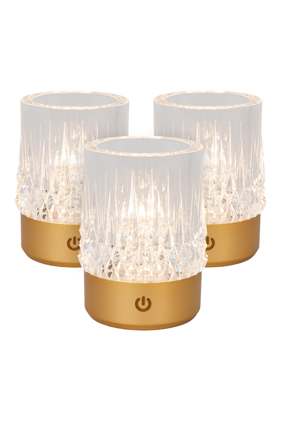 Trois exemplaires du luminaire allumés, alignés sur fond blanc, montrant la base dorée.
