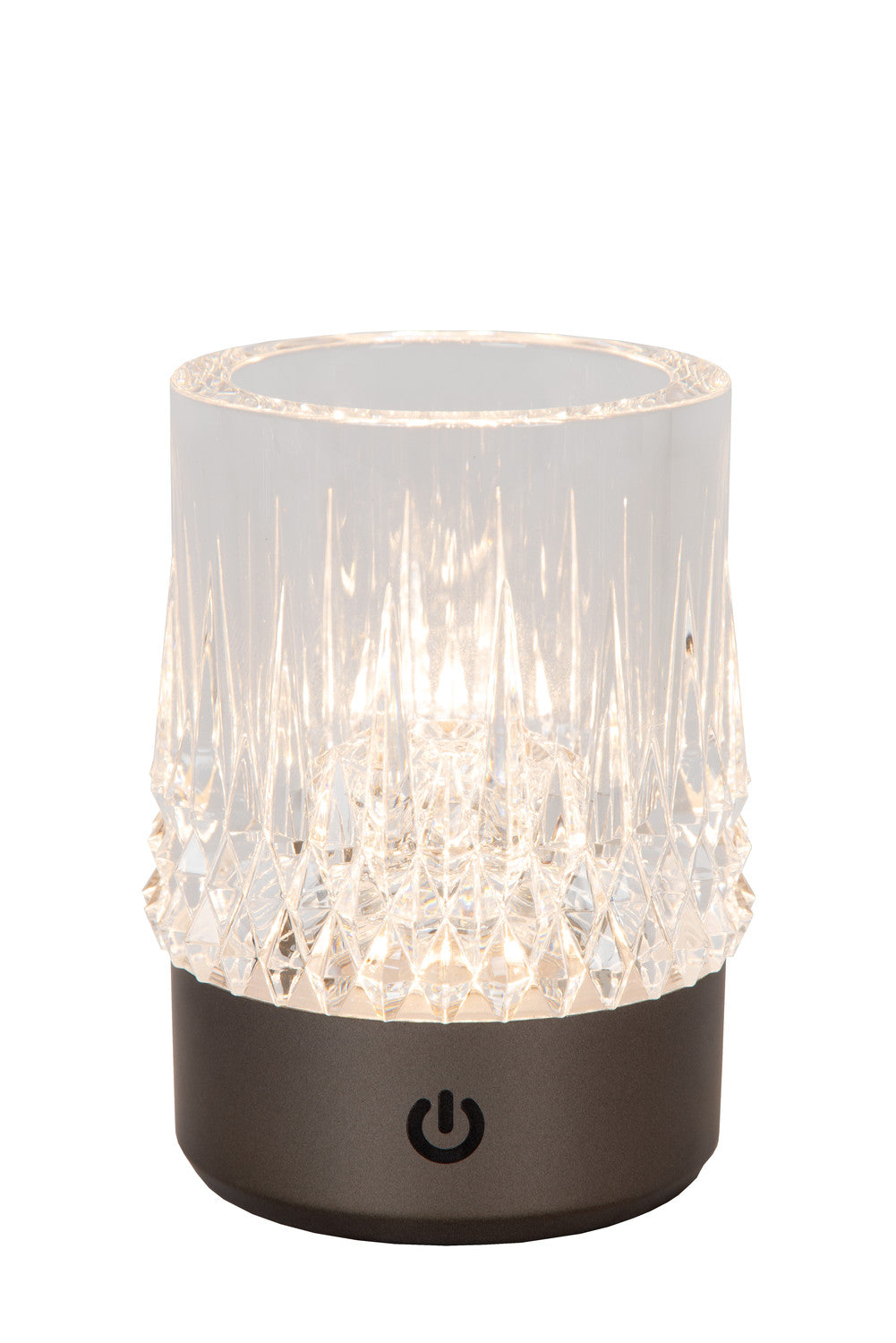 Lampe cylindrique allumée vue de face, socle noir et diffuseur cristal sur fond blanc