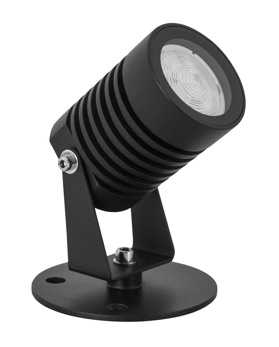 Vue rapprochée du corps cylindrique cannelé et de la lentille striée du projecteur